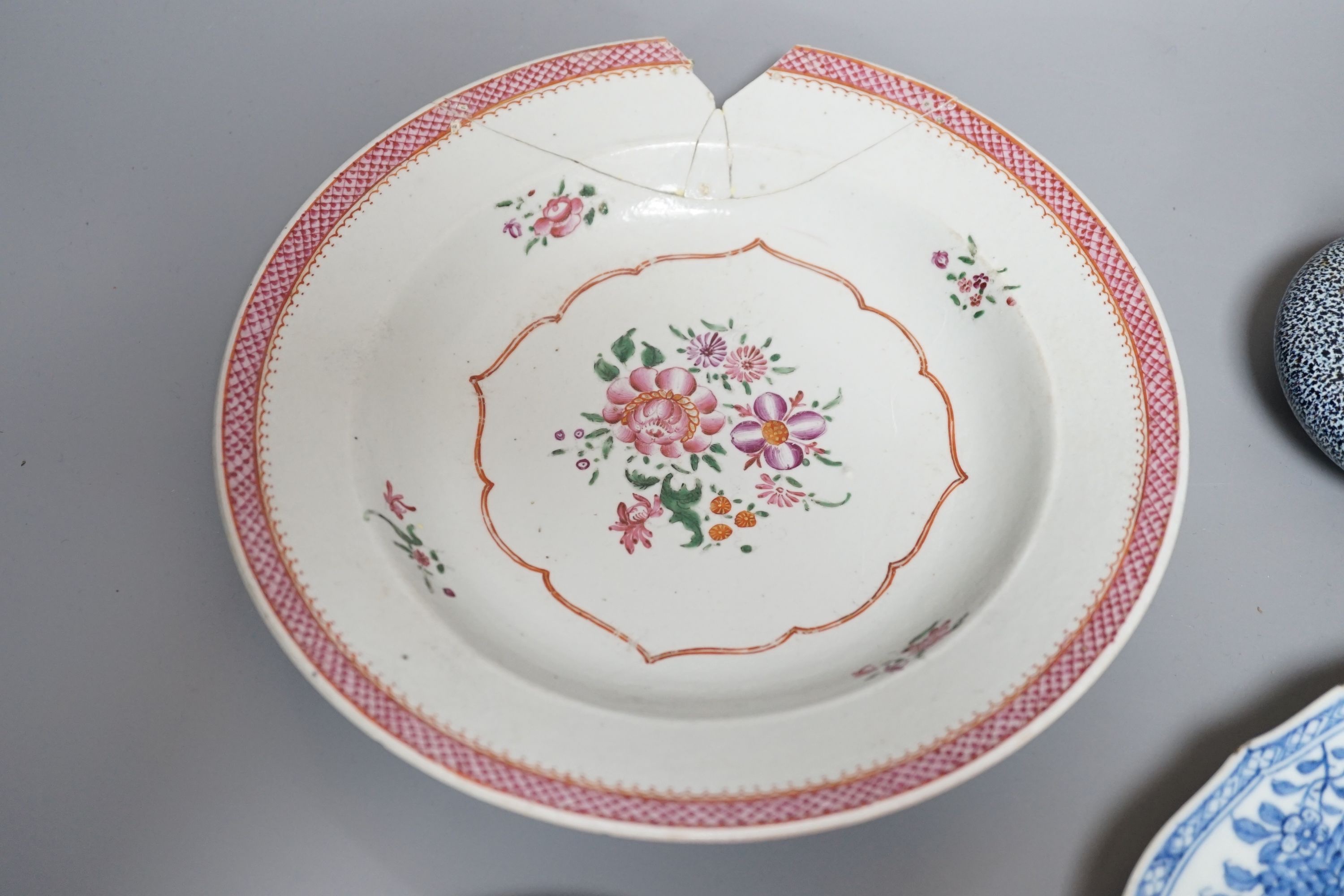 An 18th century Chinese export blue and white dish, 23cm, together with three other Chinese ceramic items
